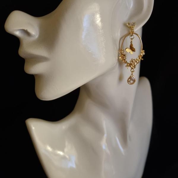 Vergulde statement oorbellen 'vlindertuin'