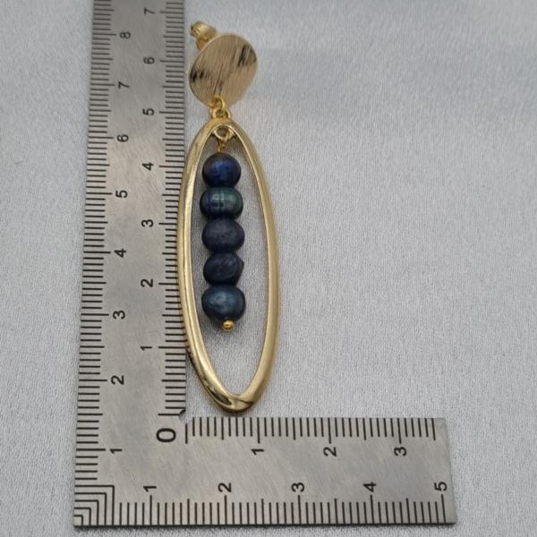 Luxe handgemaakte oorbellen met blauwe zoetwater parels