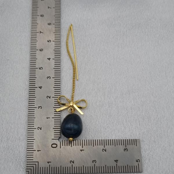 Handgemaakte vergulde doortrek oorbellen met strikjes en zoetwater parels