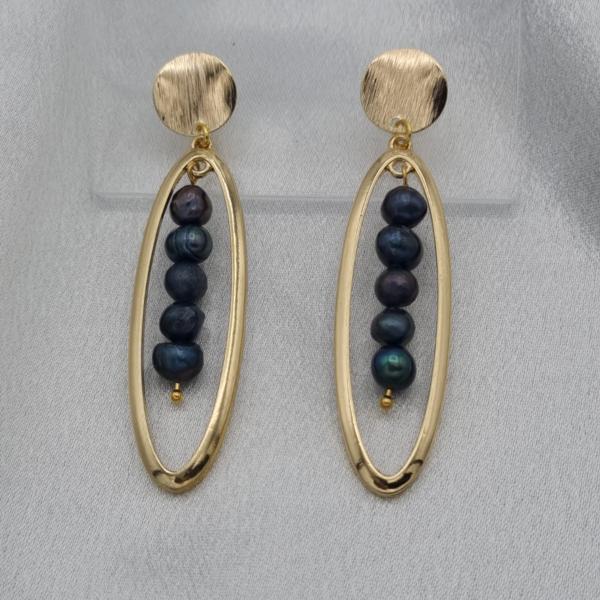 Luxe handgemaakte oorbellen met blauwe zoetwater parels