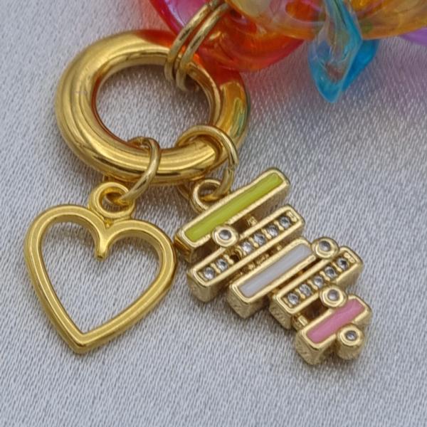 Acryl schakelarmband met vergulde onderdelen - multicolor