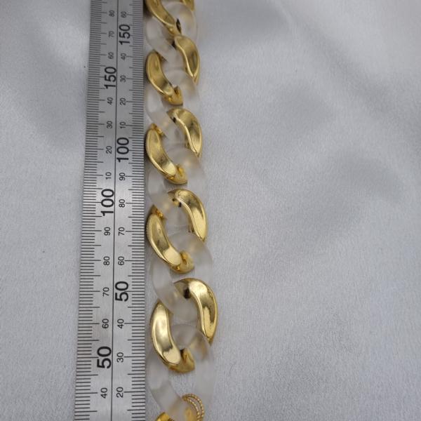 Acryl schakelarmband met vergulde onderdelen - wit/goud